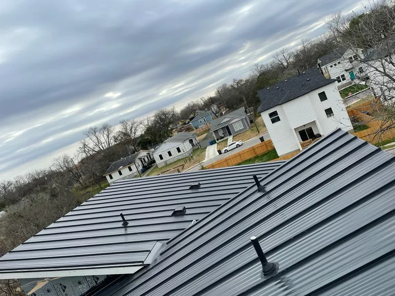 Standing seam metal roof panels with vents for Skylight Repair in Rosenberg